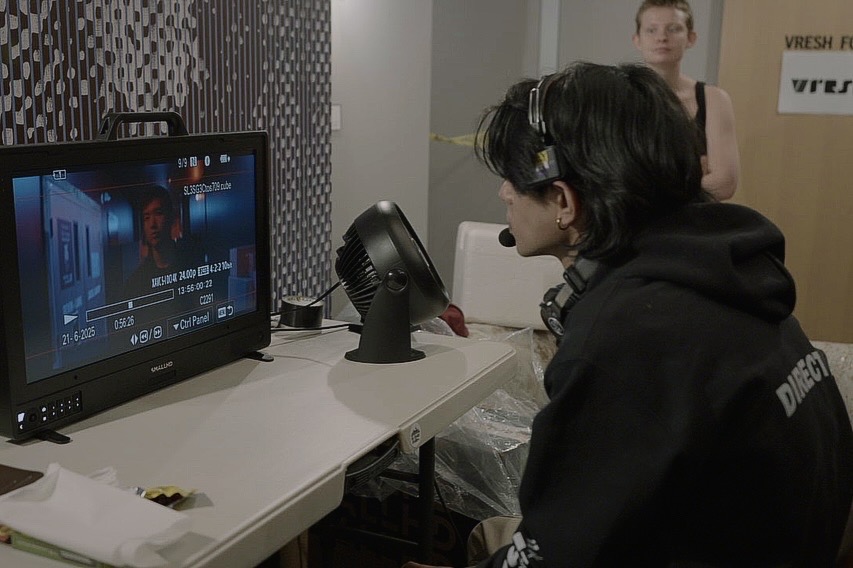 Cinematographer adjusting lights